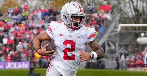 Ohio State Buckeyes wide receiver Emeka Egbuka catches a pass during a college football game in the Big Ten.